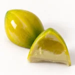 Limón Sutil: bombón entero y mitad con relleno